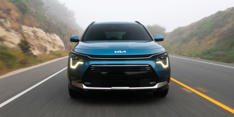 A 2025 Niro Hybrid coming at you fast on the highway near Batesville, AR 