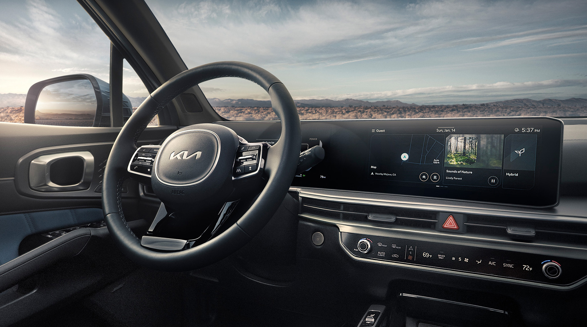 Kia car interior with steering wheel and touchscreen display