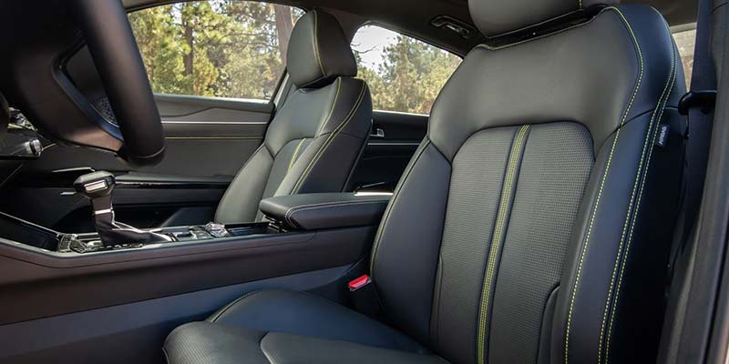 2026 Kia K5 interior in Batesville AR showing SynTex seating, panoramic sunroof, and spacious cabin for passengers